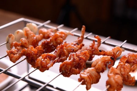 Spicy chicken feet skewers, Korean cuisineの写真素材