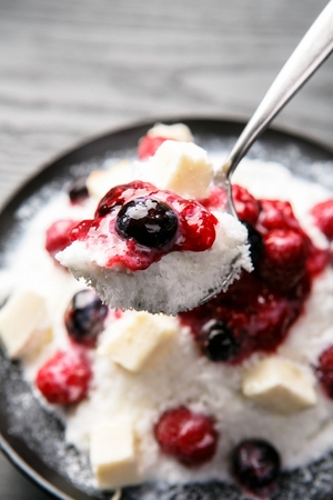 Korean Bingsu, cranberry fruit ice flakes with syrupの写真素材