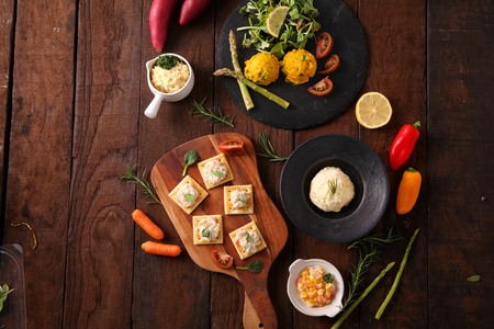 Thin crackers with tuna and various toppings, CanapÃ©