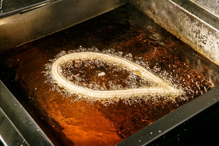 Bread dipped in syrup (Churros)の写真素材