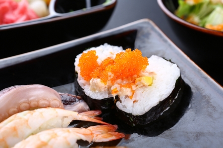 close-up shot of salmon roe roll from sushi setの写真素材