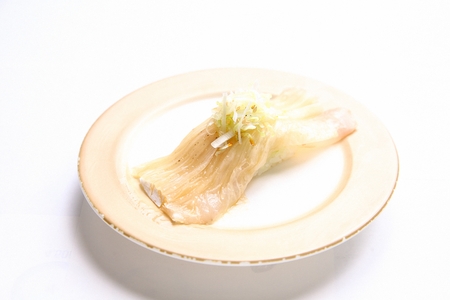 white kimchi sushi on plate, white backgroundの写真素材