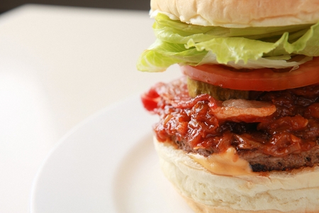 Handmade chili sauce burger, on a white plate