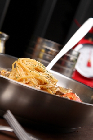 Pescatore rose pasta on a stainless plateの写真素材
