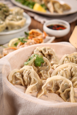 Closeup of six rib dumplings in a steamerの写真素材