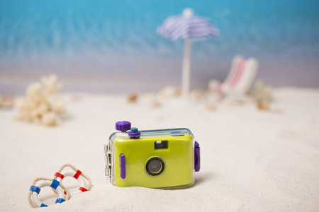 Summer holiday concept photo. vacation items and beach accessories in swimming pool or yellow background. 097の写真素材