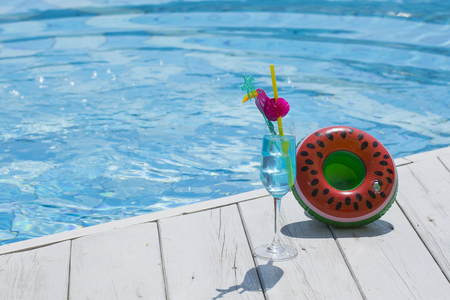 Summer holiday concept photo. vacation items and beach accessories in swimming pool or yellow background. 144の写真素材
