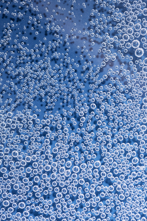 Abstract summer or ocean sea background. colorful background with ice, dry-ice, water drop close-up....