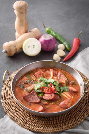 Korean-style kimchi stew with various sausages (Budae-jjige)の写真素材