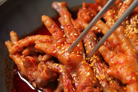 Seasoned Chicken Feet served in plateの写真素材