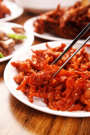 Seasoned Chicken Feet served in plateの写真素材