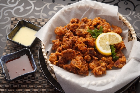 Fried chicken gizzard served in plateの写真素材