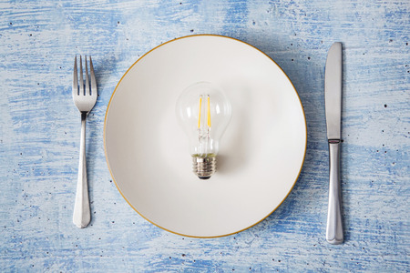 Light bulb glowing as Business idea concept with concept creative thinking and innovative solutions....