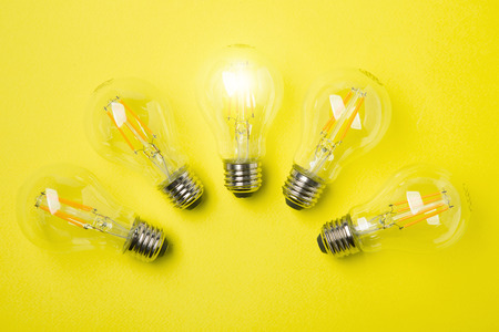Light bulb glowing as Business idea concept with concept creative thinking and innovative solutions....