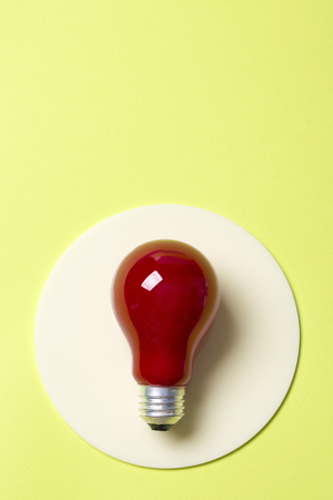 Light bulb glowing as Business idea concept with concept creative thinking and innovative solutions. 046の写真素材