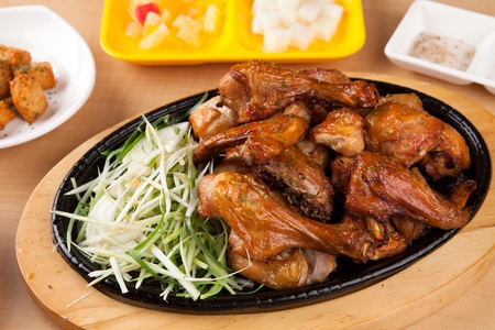 Roasted chicken on oven plateの写真素材
