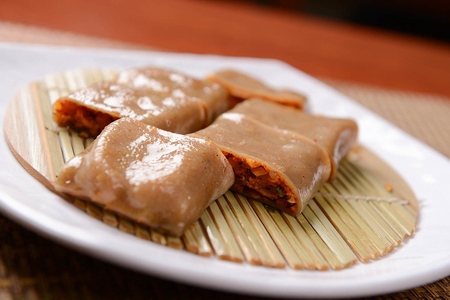 Buckwheat crepe on white rectangular plate