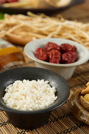 Glutinous rice and jujube placed in water, in china bowlの写真素材
