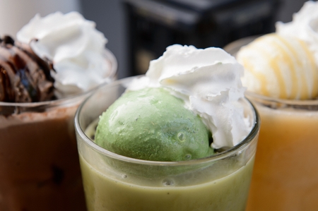 Green tea frappuccino with ice cream in glassの写真素材