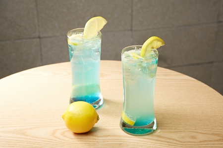 Iced blue lemonade in glassの写真素材