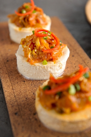 Round Tofu and Kimchi served on plate