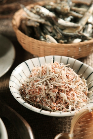 Dried Snacks served on porcelain plateの写真素材