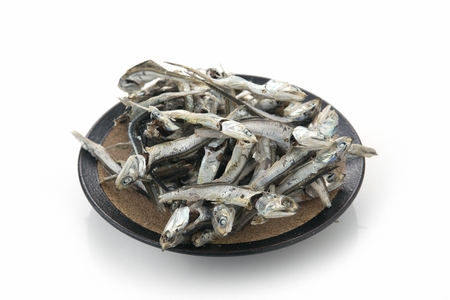Dried Snacks on porcelain plateの写真素材