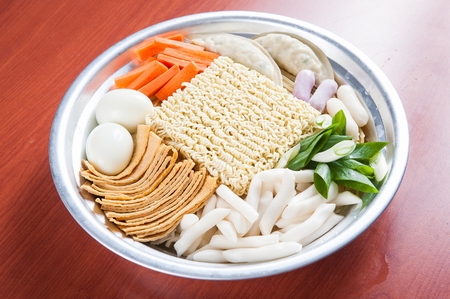 Rice Cake, Fish cake, Noodles, Eggs and Vegetables served on pan