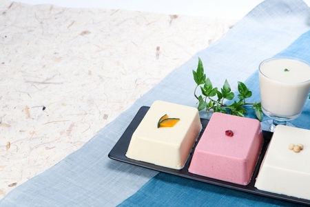 Three color soft tofu served on plateの写真素材
