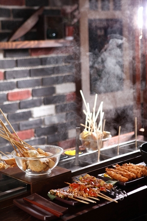 Fish Cake Kebab, Fried Shrimp, and Assorted Kebab inside Fish cake Soupの写真素材