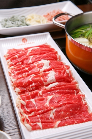 Shabu-shabu setting, close-up shot of beefの写真素材