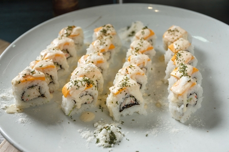 Japanese crab meat roll with salmon and sauceの写真素材