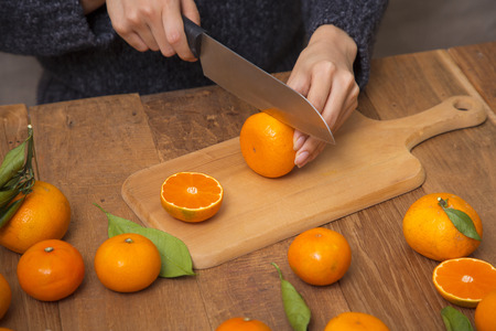 Collections of fresh Tangerines. Tangerine slices with leaves. Fruit composition.の写真素材