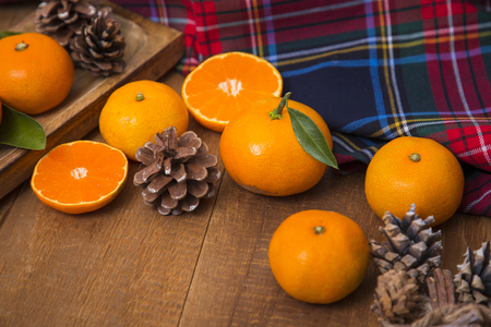 Collections of fresh Tangerines. Tangerine slices with leaves. Fruit composition.の写真素材