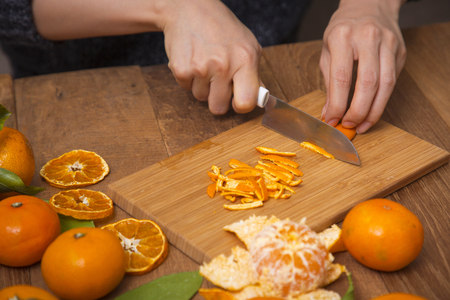 Collections of fresh Tangerines. Tangerine slices, juice with leaves. Fruit composition.の写真素材