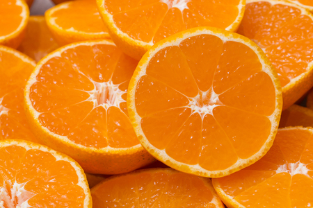 Collections of fresh Tangerines. tangerine slices, juice with leaves. Fruit composition.