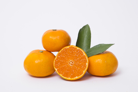 Collections of fresh Tangerines. tangerine slices, juice with leaves. Fruit composition.の写真素材
