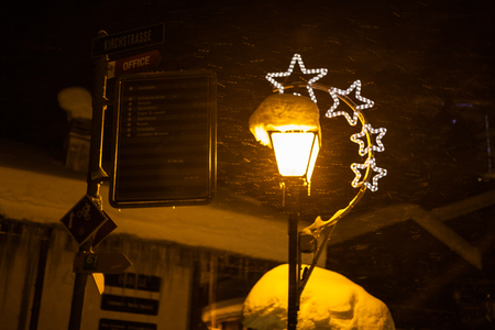 Swiss cold winter streetlights snowの写真素材