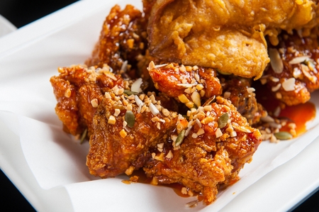 Yangnyeom, sweet and spicy chicken with fried squidの写真素材