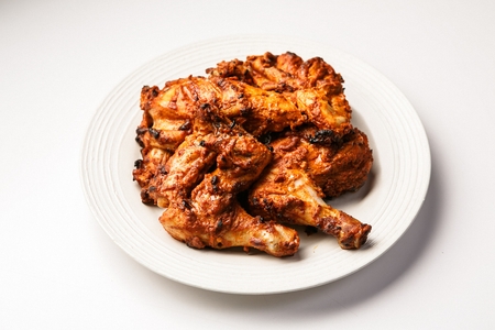 oven grilled chicken on plateの写真素材