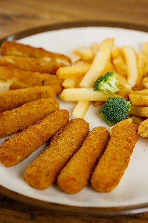 deep fried cheesesticks and fried potatoes