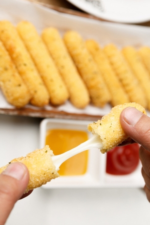 deep fried cheesesticks and sauce