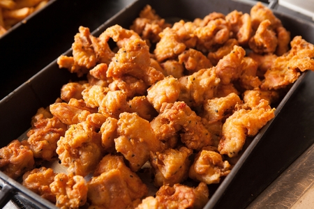 chicken fillet on stainless plate