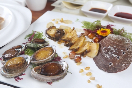 marinated abalones and Chojang, spicy chili paste