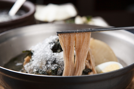 cold Soba noodles soup with iceの写真素材