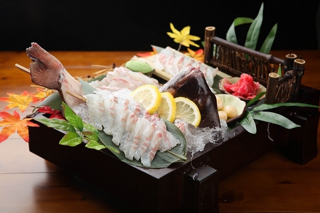 sliced raw sea bream, shallot and pickled gingerの写真素材