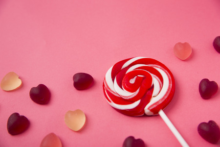 Sweet love, Valentine's day. Heart shaped candy, chocolate, macaroons and rose.の写真素材
