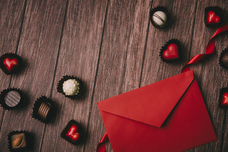 Sweet love, Valentine's day. Heart shaped candy, chocolate, macaroons and rose.の写真素材
