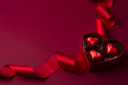 Sweet love, Valentine's day. Heart shaped candy, chocolate, macaroons and rose.
