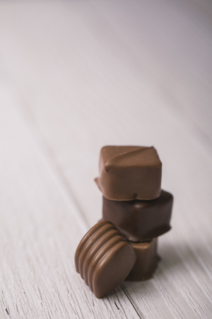 Sweet love, Valentine's day. Heart shaped candy, chocolate, macaroons and rose.の写真素材